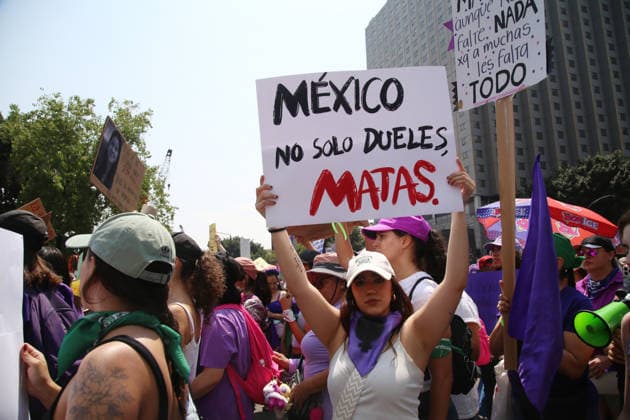 A woman lifts a placard during a rally for the International Women s Day commemoration demand stop femicides in mexico and women s rights. Thousands of women around the world join the global International Women s Day strike. on March 8, 2026 in Mexico City, Mexico. Mexico City Mexico - ZUMAe321 20260308_zia_e321_071 Copyright: xBrendaxCarrerax