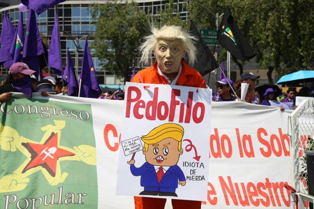 A person wearing a mask of US President Donald Trump taking part during a rally for the International Women s Day commemoration demand stop femicides in mexico and women s rights. Thousands of women around the world join the global International Women s Day strike. on March 8, 2026 in Mexico City, Mexico. Mexico City Mexico - ZUMAe321 20260308_zia_e321_081 Copyright: xBrendaxCarrerax