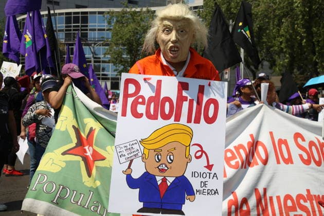 A person wearing a mask of US President Donald Trump taking part during a rally for the International Women s Day commemoration demand stop femicides in mexico and women s rights. Thousands of women around the world join the global International Women s Day strike. on March 8, 2026 in Mexico City, Mexico. Mexico City Mexico - ZUMAe321 20260308_zia_e321_083 Copyright: xBrendaxCarrerax