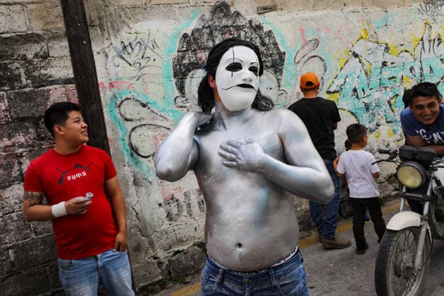 Traditional Xinacates Festival in San Nicolas de Los Ranchos A person paints his body with oil and silver-colored powder during the traditional Xinacates festival, also known as the Festival of the Painted, where they perform dances as an offering for the start of the crops and to obtain a good harvest in the municipality of San Nicolas de los Ranchos located on the slopes of the Popocatepetl volcano. on March 8, 2026 in San Nicolas de Los Ranchos, Mexico. (Photo by Ian Robles Eyepix Group) Copyright: xIanxRobles xEyepixxGroupx EL_08032026_177752JPEG