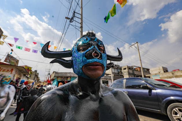 Traditional Xinacates Festival in San Nicolas de Los Ranchos An Inhabitant of San Nicolas de los Ranchos whit his body panted walking on the streets during the traditional Xinacates festival, also known as the Festival of the Painted, where they perform dances as an offering for the start of the crops and to obtain a good harvest in the municipality of San Nicolas de los Ranchos located on the slopes of the Popocatepetl volcano. on March 8, 2026 in San Nicolas de Los Ranchos, Mexico. (Photo by Ian Robles Eyepix Group) Copyright: xIanxRobles xEyepixxGroupx EL_08032026_177764JPEG