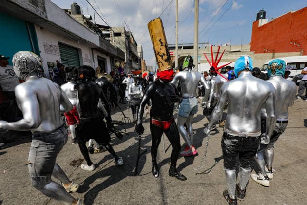 Traditional Xinacates Festival in San Nicolas de Los Ranchos Inhabitants of San Nicolas de los Ranchos whit their bodies panted walking on the streets during the traditional Xinacates festival, also known as the Festival of the Painted, where they perform dances as an offering for the start of the crops and to obtain a good harvest in the municipality of San Nicolas de los Ranchos located on the slopes of the Popocatepetl volcano. on March 8, 2026 in San Nicolas de Los Ranchos, Mexico. (Photo by Ian Robles Eyepix Group) Copyright: xIanxRobles xEyepixxGroupx EL_08032026_177766JPEG
