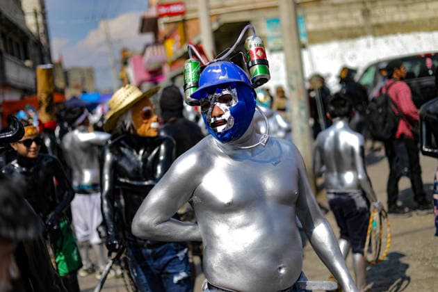 Traditional Xinacates Festival in San Nicolas de Los Ranchos Inhabitants of San Nicolas de los Ranchos whit their bodies panted walking on the streets during the traditional Xinacates festival, also known as the Festival of the Painted, where they perform dances as an offering for the start of the crops and to obtain a good harvest in the municipality of San Nicolas de los Ranchos located on the slopes of the Popocatepetl volcano. on March 8, 2026 in San Nicolas de Los Ranchos, Mexico. (Photo by Ian Robles Eyepix Group) Copyright: xIanxRobles xEyepixxGroupx EL_08032026_177767JPEG