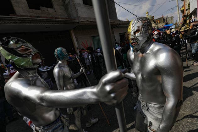Traditional Xinacates Festival in San Nicolas de Los Ranchos Inhabitants of San Nicolas de los Ranchos whit their bodies panted walking on the streets during the traditional Xinacates festival, also known as the Festival of the Painted, where they perform dances as an offering for the start of the crops and to obtain a good harvest in the municipality of San Nicolas de los Ranchos located on the slopes of the Popocatepetl volcano. on March 8, 2026 in San Nicolas de Los Ranchos, Mexico. (Photo by Ian Robles Eyepix Group) Copyright: xIanxRobles xEyepixxGroupx EL_08032026_177770JPEG