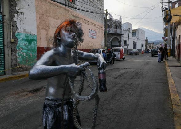 Traditional Xinacates Festival in San Nicolas de Los Ranchos An Inhabitant of San Nicolas de los Ranchos whit his body panted poses during the traditional Xinacates festival, also known as the Festival of the Painted, where they perform dances as an offering for the start of the crops and to obtain a good harvest in the municipality of San Nicolas de los Ranchos located on the slopes of the Popocatepetl volcano. on March 8, 2026 in San Nicolas de Los Ranchos, Mexico. (Photo by Ian Robles Eyepix Group) Copyright: xIanxRobles xEyepixxGroupx EL_08032026_177786JPEG
