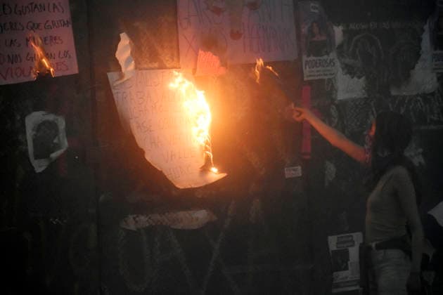 Protest For International Women s Day A woman burns placards in a rally for International Women s Day at main square Zocalo. on March 8, 2026 in Mexico City, Mexico. (Photo by Luis Barron Eyepix Group) Copyright: xLuisxBarronx xEyepixxGroupx LB_08032026_177797