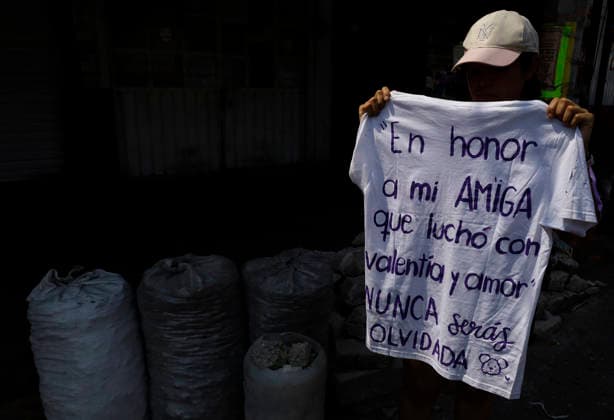 March 8, 2026, ChimalhuacaN, State Of Mexico, Mexico: A woman holds a t-shirt with a message in support of mothers and relatives of victims of disappearance and femicide, who are marching toward the municipal seat of Chimalhuacan in the State of Mexico to demand justice and punishment for the perpetrators, on the occasion of International Women s Day in Mexico. According to the United Nations, International Women s Day is commemorated in many countries around the world. When women from all continents, often separated by national borders and ethnic, linguistic, cultural, economic and political differences, come together on this day, they can contemplate a tradition of no less than ninety years of struggle for equality, justice, peace and d - ZUMAs197 20260308_aaa_s197_582 Copyright: xGerardoxVieyrax