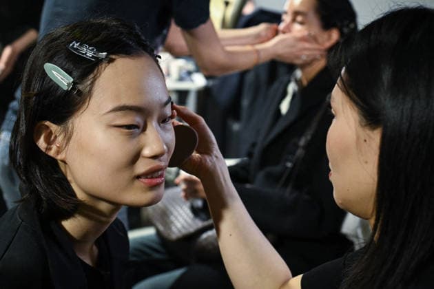 PFW - Backstage of Shiatzy Chen Runway in Paris FA A model gets prepared before the runway for the Shiatzy Chen collection as part of Paris Fashion Week in Paris, on March 9, 2026. Photo by Firas Abdullah ABACAPRESS.COM Paris Ile-de-France France  Copyright: xAbdullahxFiras ABACAx