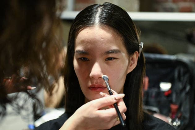 PFW - Backstage of Shiatzy Chen Runway in Paris FA A model gets prepared before the runway for the Shiatzy Chen collection as part of Paris Fashion Week in Paris, on March 9, 2026. Photo by Firas Abdullah ABACAPRESS.COM Paris Ile-de-France France  Copyright: xAbdullahxFiras ABACAx