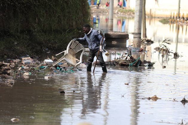 Torrential rains cause deadly flooding in Kenya NAIROBI, KENYA - MARCH 9: A man walks through accumulated floodwaters as several streets in the capital are affected in Nairobi, Kenya, on March 9, 2026. The death toll from floods caused by heavy rains has risen to 42. Lucas Mukasa Anadolu Nairobi Kenya. Editorial use only. Please get in touch for any other usage.  Copyright: x2026xAnadoluxLucasxMukasax