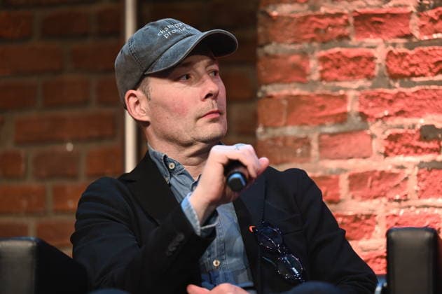 Author Tom Hillenbrand reads and speaks at Lit Cologne, the international literature festival