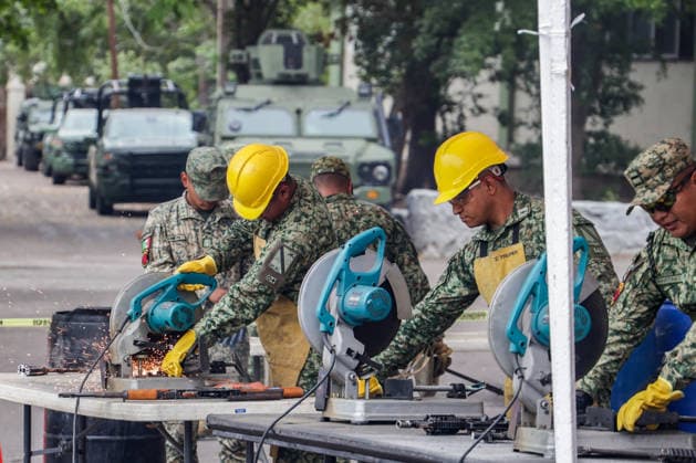 Mexican Army destroys seized weapons in Sinaloa SINALOA, MEXICO - MARCH 09: The Mexican Army destroy 610 long guns and 92 handguns, as well as 5,013 magazines and 316,036 rounds of ammunition during an official ceremony at the 9th Military Zone in Sinaloa, Mexico, on March 09, 2026. These weapons were seized from organized crime during recent federal operations in Sinaloa. Among the destroyed weapons were Colt 1911 pistols with gold embellishments that may have belonged to drug traffickers. Weapons seizures have increased in recent months due to the greater military presence in Sinaloa amid the ongoing conflict between internal factions of the Sinaloa Cartel. Jesus Verdugo Anadolu Sinaloa Mexico. Editorial use only. Please get in touch fo  Copyright: x2026xAnadoluxJesusxVerdugox