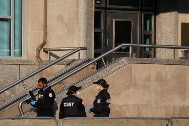 March 10, 2026, Toronto, On, CANADA: Forensic Toronto police officers looks for evidence at the U.S. consulate in Toronto on Tuesday March 10, 2026. Police are investigating reports that the United States consulate in Toronto s downtown core was hit by early morning gunfire Tuesday. Toronto CANADA  - ZUMAc35_ 20260310_zaf_c35_001 Copyright: xFrankxGunnx