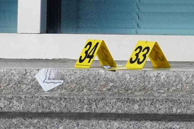 March 10, 2026, Toronto, On, CANADA: Evidence markers shown a bullet impact near a front window at U.S. consulate in Toronto on Tuesday March 10, 2026. Police are investigating reports that the United States consulate in Toronto s downtown core was hit by early morning gunfire Tuesday. Toronto CANADA  - ZUMAc35_ 20260310_zaf_c35_006 Copyright: xFrankxGunnx