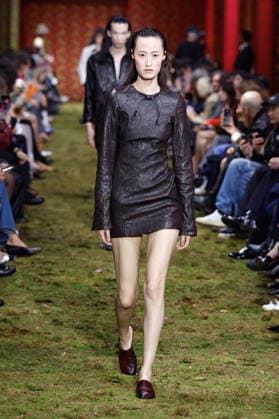 (260311) -- PARIS, March 11, 2026 -- A model presents a creation from the Ready-to-Wear Fall Winter 2026-2027 collections by Miu Miu during the Paris Fashion Week, in Paris, France, on March 10, 2026. ( Handout via Xinhua) FRANCE-PARIS-FASHION WEEK-MIU MIU MeetEurope 