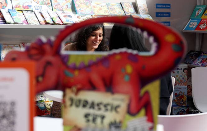 (260311) -- LONDON, March 11, 2026 -- People talk at the 2026 London Book Fair in London, Britain, March 10, 2026. The 2026 London Book Fair kicked off here on Tuesday. ) BRITAIN-LONDON-BOOK FAIR-OPENING LixYing 