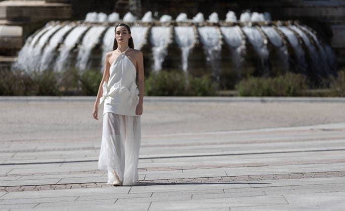 Inaugural fashion show of OMODA Madrid es Moda in Plaza de Espana Inaugural fashion show of OMODA Madrid es Moda in Plaza de Espana, on March 12, 2026, in Madrid Spain Organized by the Asociación Creadores de Moda de Espana ACME and the Madrid City Council, the show brings together 24 designers on an outdoor runway with the historic buildings as a backdrop, the show brings together 24 designers on an open-air catwalk with the historic buildings of the square as a backdrop, combining established names - Devota Lomba, Roberto Verino, Roberto Torretta, Oteyza - with avant-garde firms such as Eduardo Navarrete and Dominnico 12 MARCH 2026 Madrid Madrid Spain  Copyright: xEduardoxParrax 7360575