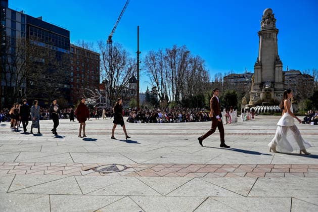 March 12, 2026, Madrid, Madrid, SPAIN: Models walk the runway on the urban catwalk set up in Plaza de EspaoÂ±a during the opening event of OMODA Madrid es Moda, marking the start of Madrid Fashion Week. The show brings together 25 Spanish independent fashion designers in one of the capital s most iconic locations. Madrid SPAIN  - ZUMAz108 20260312_znp_z108_026 Copyright: xRichardxZubelzux