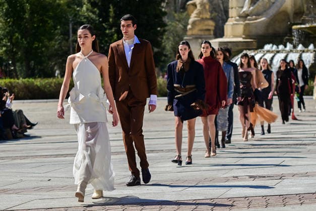 March 12, 2026, Madrid, Madrid, SPAIN: Models walk the runway on the urban catwalk set up in Plaza de EspaoÂ±a during the opening event of OMODA Madrid es Moda, marking the start of Madrid Fashion Week. The show brings together 25 Spanish independent fashion designers in one of the capital s most iconic locations. Madrid SPAIN - ZUMAz108 20260312_znp_z108_032 Copyright: xRichardxZubelzux