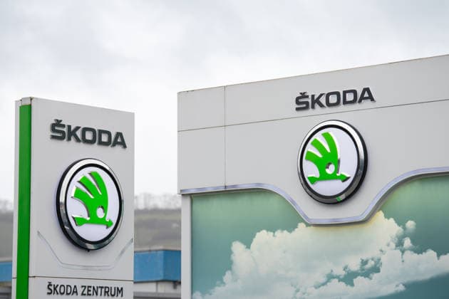 Logo the Brand Skoda, Czech Automobile manufacturer, Profit slump the Industry in Germany, Trier 1133606239