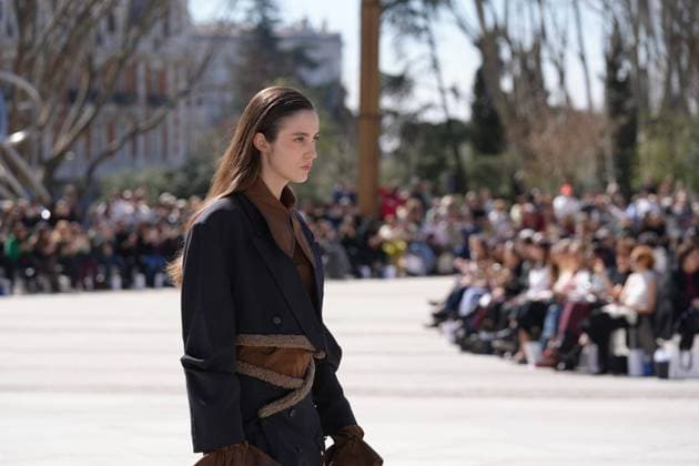 March 12, 2026, Madrid, Madrid, SPAIN: Models walk the runway on the urban catwalk set up in Plaza de Espana during the opening event of OMODA Madrid es Moda, marking the start of Madrid Fashion Week. The show brings together 25 Spanish independent fashion designers in one of the capital s most iconic locations Cordon Press 