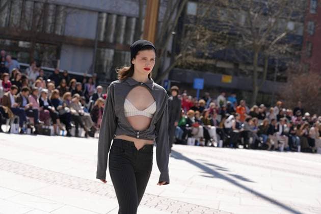 March 12, 2026, Madrid, Madrid, SPAIN: Models walk the runway on the urban catwalk set up in Plaza de Espana during the opening event of OMODA Madrid es Moda, marking the start of Madrid Fashion Week. The show brings together 25 Spanish independent fashion designers in one of the capital s most iconic locations Cordon Press 