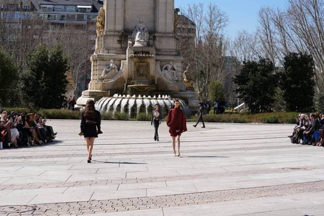 March 12, 2026, Madrid, Madrid, SPAIN: Models walk the runway on the urban catwalk set up in Plaza de Espana during the opening event of OMODA Madrid es Moda, marking the start of Madrid Fashion Week. The show brings together 25 Spanish independent fashion designers in one of the capital s most iconic locations Cordon Press 