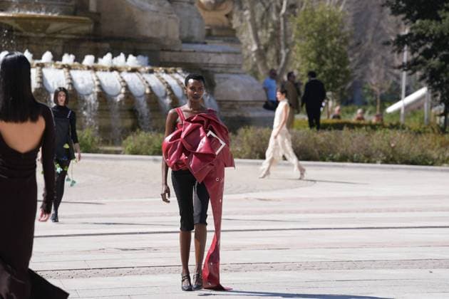 March 12, 2026, Madrid, Madrid, SPAIN: Models walk the runway on the urban catwalk set up in Plaza de Espana during the opening event of OMODA Madrid es Moda, marking the start of Madrid Fashion Week. The show brings together 25 Spanish independent fashion designers in one of the capital s most iconic locations Cordon Press 