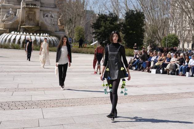 March 12, 2026, Madrid, Madrid, SPAIN: Models walk the runway on the urban catwalk set up in Plaza de Espana during the opening event of OMODA Madrid es Moda, marking the start of Madrid Fashion Week. The show brings together 25 Spanish independent fashion designers in one of the capital s most iconic locations Cordon Press 