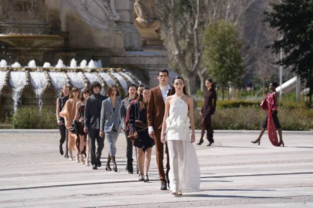 March 12, 2026, Madrid, Madrid, SPAIN: Models walk the runway on the urban catwalk set up in Plaza de Espana during the opening event of OMODA Madrid es Moda, marking the start of Madrid Fashion Week. The show brings together 25 Spanish independent fashion designers in one of the capital s most iconic locations Cordon Press 