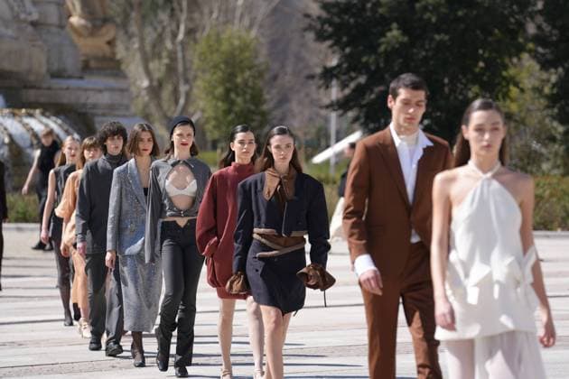 March 12, 2026, Madrid, Madrid, SPAIN: Models walk the runway on the urban catwalk set up in Plaza de Espana during the opening event of OMODA Madrid es Moda, marking the start of Madrid Fashion Week. The show brings together 25 Spanish independent fashion designers in one of the capital s most iconic locations Cordon Press 
