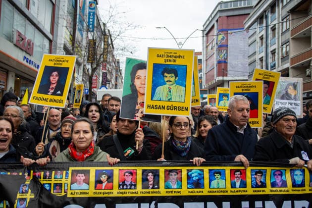 March 12, 2026, Istanbul, Istanbul, Turkey: People gather to commemorate the victims of the Gazi Massacre on its anniversary in the Gazi neighborhood of Istanbul, Turkey. Participants carried photographs of those killed and laid flowers during the memorial ceremony. The Gazi Massacre refers to the events that began on March 12, 1995, when attacks on coffeehouses in the Gazi neighborhood triggered protests and clashes that resulted in multiple deaths. Istanbul Turkey  - ZUMAt171 20260312_zip_t171_009 Copyright: xAbdullahxTepelix