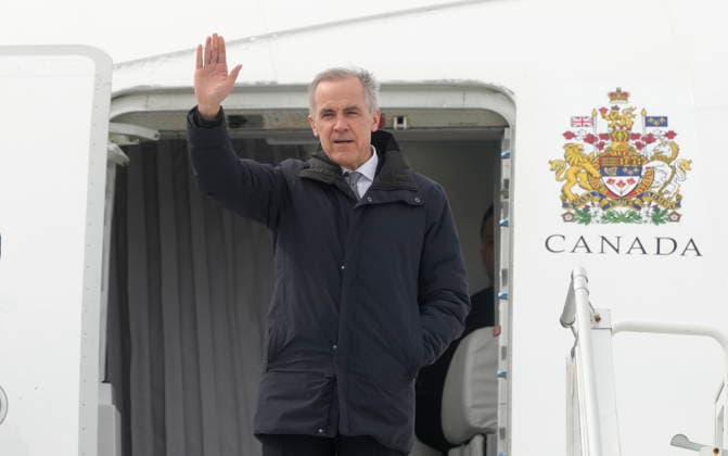 March 12, 2026, Ottawa, On, Canada: Prime Minister Mark Carney waves as he boards a government plane in Ottawa, Thursday, March 12, 2026. Ottawa Canada  - ZUMAc35_ 20260312_zaf_c35_024 Copyright: xAdrianxWyldx