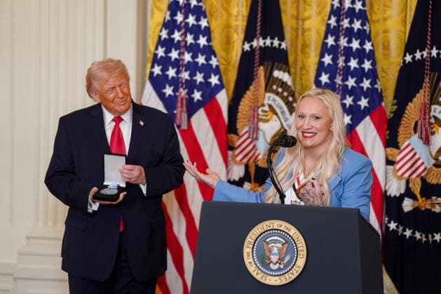 Kaillie Humphries, US Olympic bronze medalist bobsled athlete, presents the Order of Ikkos to President Donald Trump during a Women s History Month event in the East Room of the White House in Washington, DC, US, on Thursday, March 12, 2026. Every year, March is designated Women s History Month by presidential proclamation.  WASP2026031207 ALxDRAGO