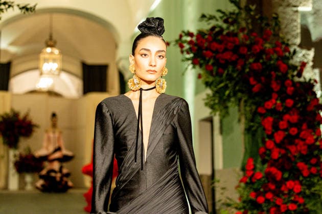 Juana Martín presents her new collection of flamenco fashion and prêt a porter A model parades presenting the new collection of flamenco fashion and prêt a porter of the designer Juana Martín, at the Real Academia de Bellas Artes de San Fernando, on March 12, 2026, in Madrid Spain Juana Martín, designer from Cordoba of gypsy origin and the first Spanish woman to parade in the Haute Couture in Paris, presents today her flamenco collection Herencia The fashion show, framed in the Madrid fashion week OMODA Madrid es Moda , is her only event in Spain in 2026 and pays tribute to the flower as a timeless symbol of flamenco 12 MARCH 2026 FASHION DESIGNER COLLECTION MODEL SHOWS SHOWS catwalk Madrid Madrid Spain  Copyright: xRicardoxRubiox 7361772