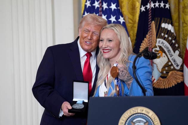 Donald Trump on Women s History Month - Washington US Olympic bronze medalist bobsled athlete Kaillie Humphries presents the Order of Ikkos to President Donald Trump during a Women s History Month Event in the East Room of the White House in Washington on March 12, 2026. Photo by Yuri Gripas ABACAPRESS.COM Washington DC United States  Copyright: xGripasxYuri ABACAx
