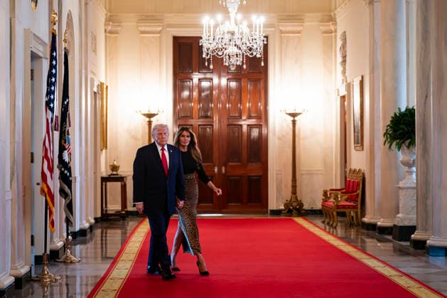 President Donald Trump and First Lady Melania Trump Women s History Month arrive for an event in the East Room of the White House in Washington, DC, US, on Thursday, March 12, 2026. Every year, March is designated Women s History Month by presidential proclamation.  WASP2026031210 ALxDRAGO