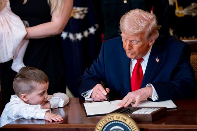 President Donald Trump signs a proclamation celebrating Women s History Month during an event in the East Room of the White House in Washington, DC on Thursday, March 12, 2026.  WAP20260312354A BONNIExCASH