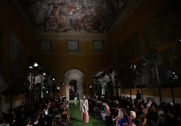Valentino Runway - Rome A model walks the runway under Pietro da Cortona s spectacular ceiling fresco, ‘The Triumph of Divine Providence’ at Italian fashion house Valentino Show ‘Interferenze’ Fall Winter 2026 collection at Palazzo Barberini in Rome, Italy on March 12, 2026, two months after the death of founder Valentino Garavani. Italian fashion house Valentino returned to its roots with an evocative catwalk show held in the galleries of the Palazzo Barberini, a Baroque palace now home to masterpieces of the greatest artists of the Renaissance. Photo by Eric Vandeville ABACAPRESS.COM Rome Italy  Copyright: xVandevillexEric ABACAx