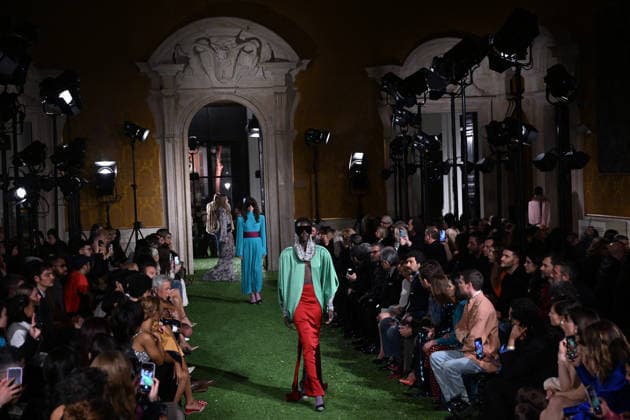 Valentino Runway - Rome A model walks the runway at Italian fashion house Valentino Show ‘Interferenze’ Fall Winter 2026 collection at Palazzo Barberini in Rome, Italy on March 12, 2026, two months after the death of founder Valentino Garavani. Italian fashion house Valentino returned to its roots with an evocative catwalk show held in the galleries of the Palazzo Barberini, a Baroque palace now home to masterpieces of the greatest artists of the Renaissance. Photo by Eric Vandeville ABACAPRESS.COM Rome Italy  Copyright: xVandevillexEric ABACAx