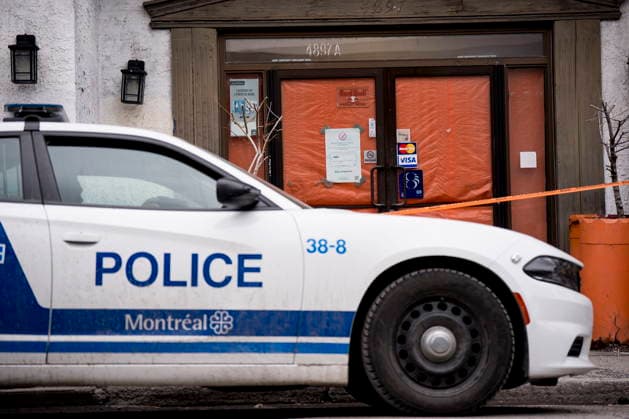 March 13, 2026, Montreal, Pq, CANADA: Police stand by outside a convenience store where a man was killed the day before, in Montreal on Friday, March 13, 2026. Montreal CANADA  - ZUMAc35_ 20260313_zaf_c35_093 Copyright: xChristopherxKatsarovx