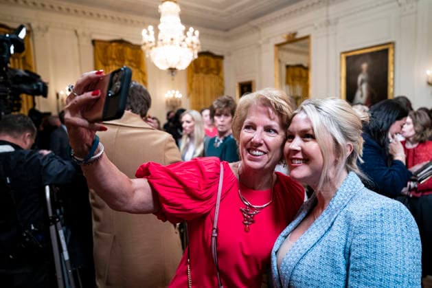 Trump Hosts Women s History Month Event Karoline Leavitt, White House press secretary, poses for a selfie photograph with an attendee during a Women s History Month event in the East Room of the White House in Washington, DC, USA, on Thursday, March 12, 2026. Every year, March is designated Women s History Month by presidential proclamation. Credit: CNP AdMedia Washington District of Columbia United States of America EDITORIAL USE ONLY  Copyright: xx AD_06_WHwomens CNPx xAdMediax admphotostwo974282