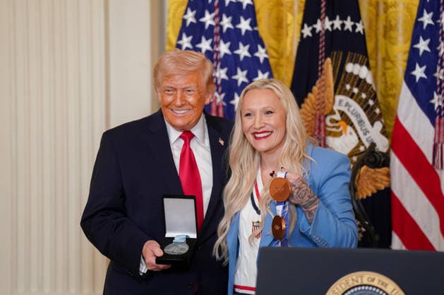 Trump Hosts Women s History Month Event Kaillie Humphries, United States Olympic bronze medalist bobsled athlete, presents the Order of Ikkos to US President Donald J Trump during a Women s History Month event in the East Room of the White House in Washington, DC, USA, on Thursday, March 12, 2026. Every year, March is designated Women s History Month by presidential proclamation. Credit: CNP AdMedia Washington District of Columbia United States of America EDITORIAL USE ONLY  Copyright: xx FTP_AD_04007_1-6137911 CNPx xAdMediax admphotostwo974283