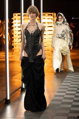 Evade House - MadridEsModa Fashion Week Madrid - 13 Mar 2026 A model walks the runway wearing a design by Evade House during the MadridEsModa Fashion Week de at Madrid Arena. Madrid Spain Copyright: xAtilanoxGarciax xSOPAxImagesx photos08334