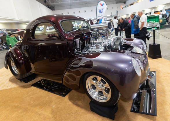 (260314) -- MISSISSAUGA, March 14, 2026 -- People view a custom vehicle at the 2026 Motorama Custom Car & Motorsports Expo in Mississauga, the Greater Toronto Area, Canada, March 13, 2026. The three-day event kicked off here on Friday, showcasing more than 400 custom vehicles. (Photo by Xinhua) CANADA-MISSISSAUGA-MOTORAMA-EXPO ZouxZheng 