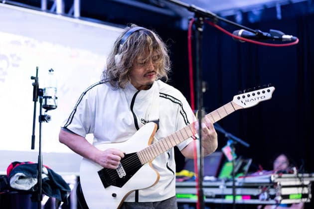 March 13, 2026: The band Gokumon is a three-piece band formed in Japan in 2004. Atsushi Osawa on guitar performing at the SXSW Music Festival, Downright Austin Global Stage at Downright Austin Backyard. Austin, Texas. CSM Austin United States of America - ZUMAc04_ 20260313_faf_c04_026 Copyright: xMarioxCantux