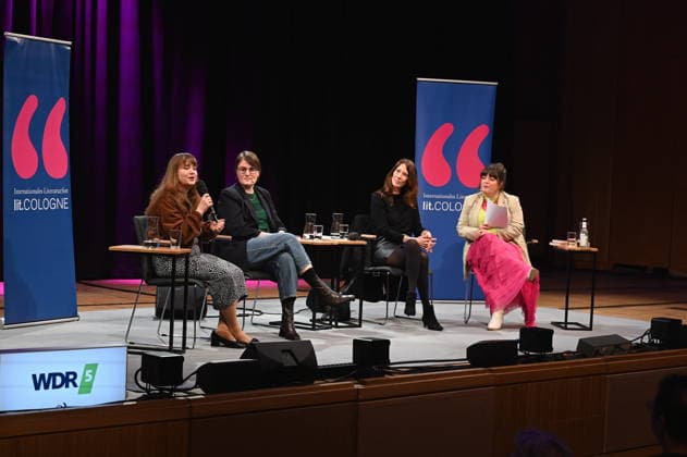 Politician Ricarda Lang, author Eva Thöne, Anna Sophie Herken and moderator Marie Christine Knop, l r, read and talk about women in power on stage at Lit Cologne, the international literary festival on the theme Bye bye, Thomas