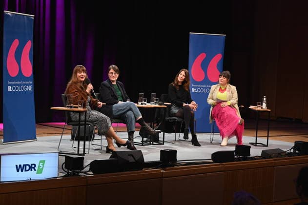 Politician Ricarda Lang, author Eva Thöne, Anna Sophie Herken and moderator Marie Christine Knop, l r, read and talk about women in power on stage at Lit Cologne, the international literary festival on the theme Bye bye, Thomas