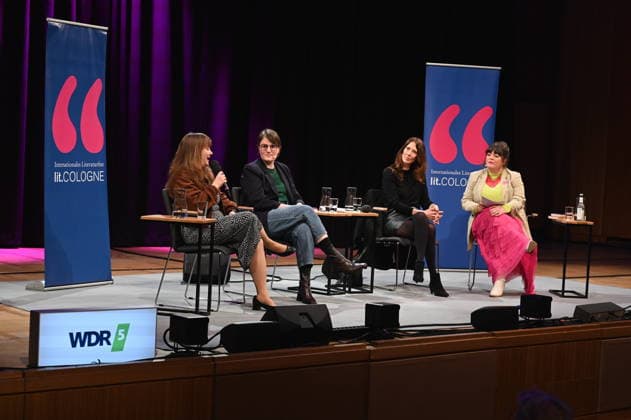Politician Ricarda Lang, author Eva Thöne, Anna Sophie Herken and moderator Marie Christine Knop, l r, read and talk about women in power on stage at Lit Cologne, the international literary festival on the theme Bye bye, Thomas