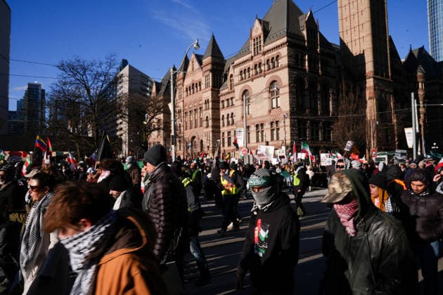 Al-Quds Day Rally in Toronto TORONTO, CANADA - MARCH 14 : People take part in a Al-Quds Day rally in Toronto, Ontario, Canada on March 14, 2026. Demonstrators carrying Palestinian and Iranian flags gathered near US Consulate General to protest Israel and the United States attacks on Iran and Lebanon, and marched in downtown Toronto. Mert Alper Dervis Anadolu Toronto Canada. Editorial use only. Please get in touch for any other usage.  Copyright: x2026xAnadoluxMertxAlperxDervisx